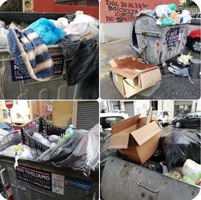Cagliari, a San Benedetto cassonetti superstiti ingolfati: chili di rifiuti, anche plastica e vestiti