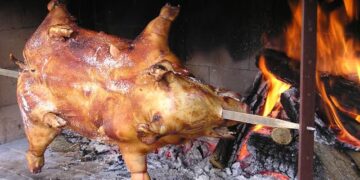 Il maialetto re della tavola di Ferragosto, ma scatta l’allarme: prezzi bassi e origine non sicura, urge l’Igp
